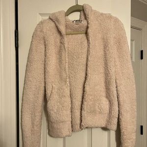 Light pink ultra cozy Barefoot Dreams zip up hoodie.